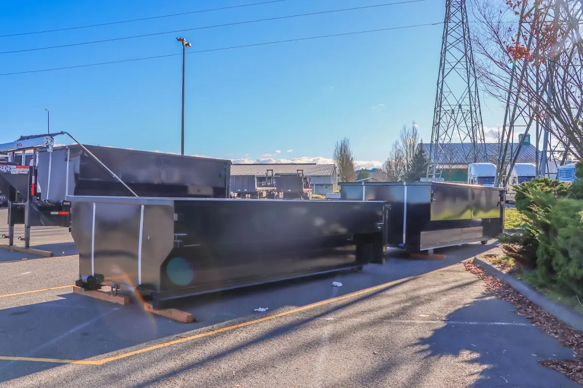 Roll-off dumpster ready for waste disposal at job site for Construction Dumpster Rental in North Decatur